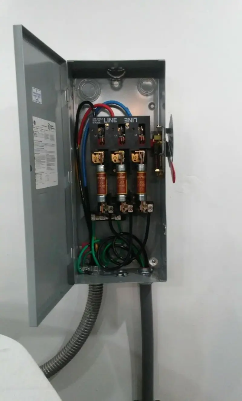 Three-phase disconnect switch installed for Smoke Detector Installation in Silvis